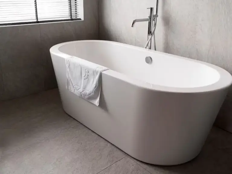 minimalistic-white-bathtub-with-towel bathtub replacement near me