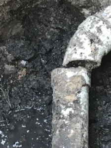 cracked sewer pipe in basement